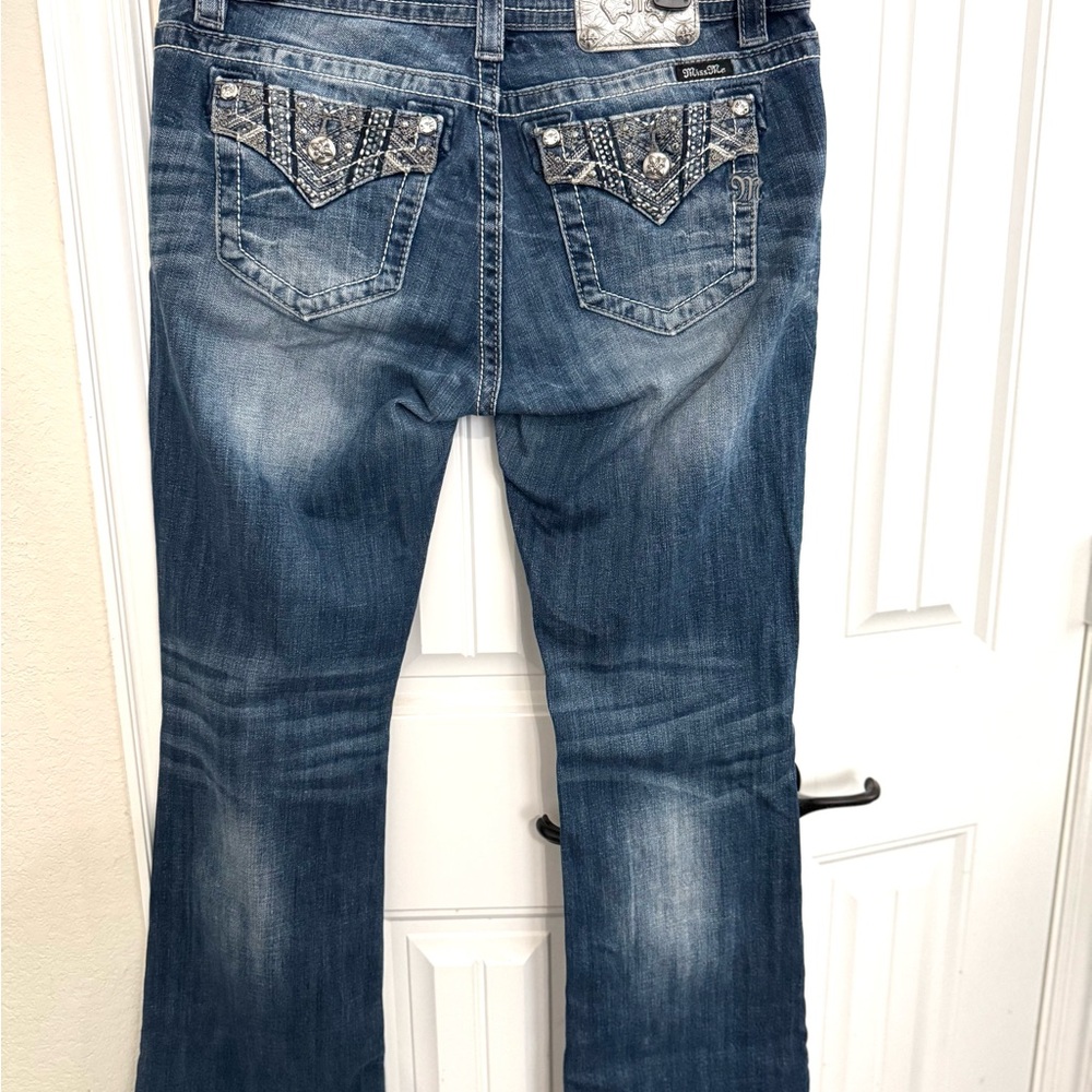 Women's Miss Me Boot Cut Blue Jeans with Embellished Pockets